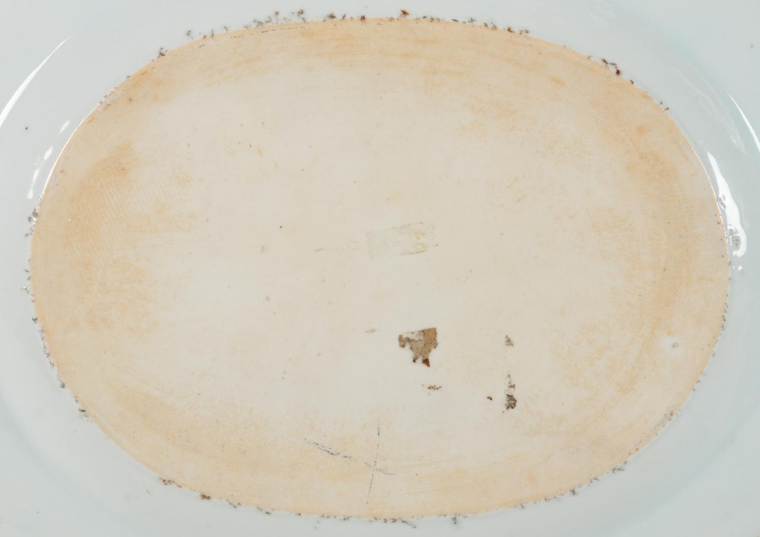 A Pair of Chinese Export Porcelain Armorial Platters Raised on Later Mahogany Stands