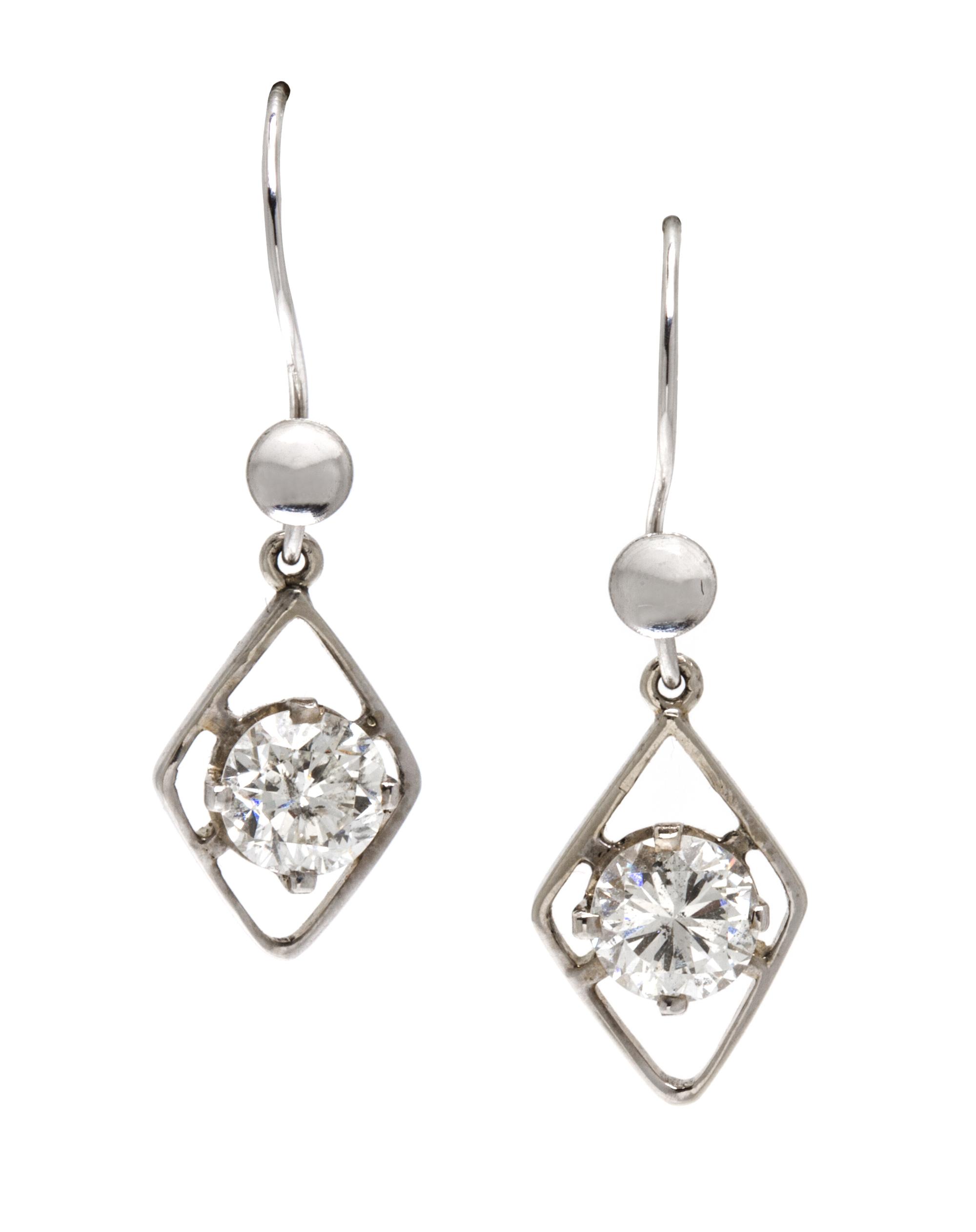 A Pair of White Gold and Diamond Earrings, 1.60 dwts.