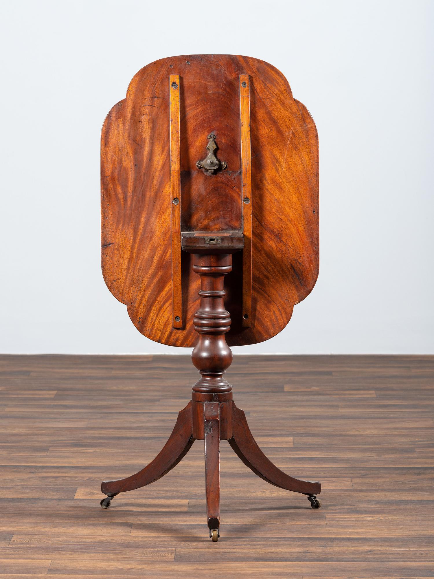 A Late Chippendale Figured Mahogany Tablet Tilt-Top Candlestand