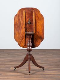 A Late Chippendale Figured Mahogany Tablet Tilt-Top Candlestand