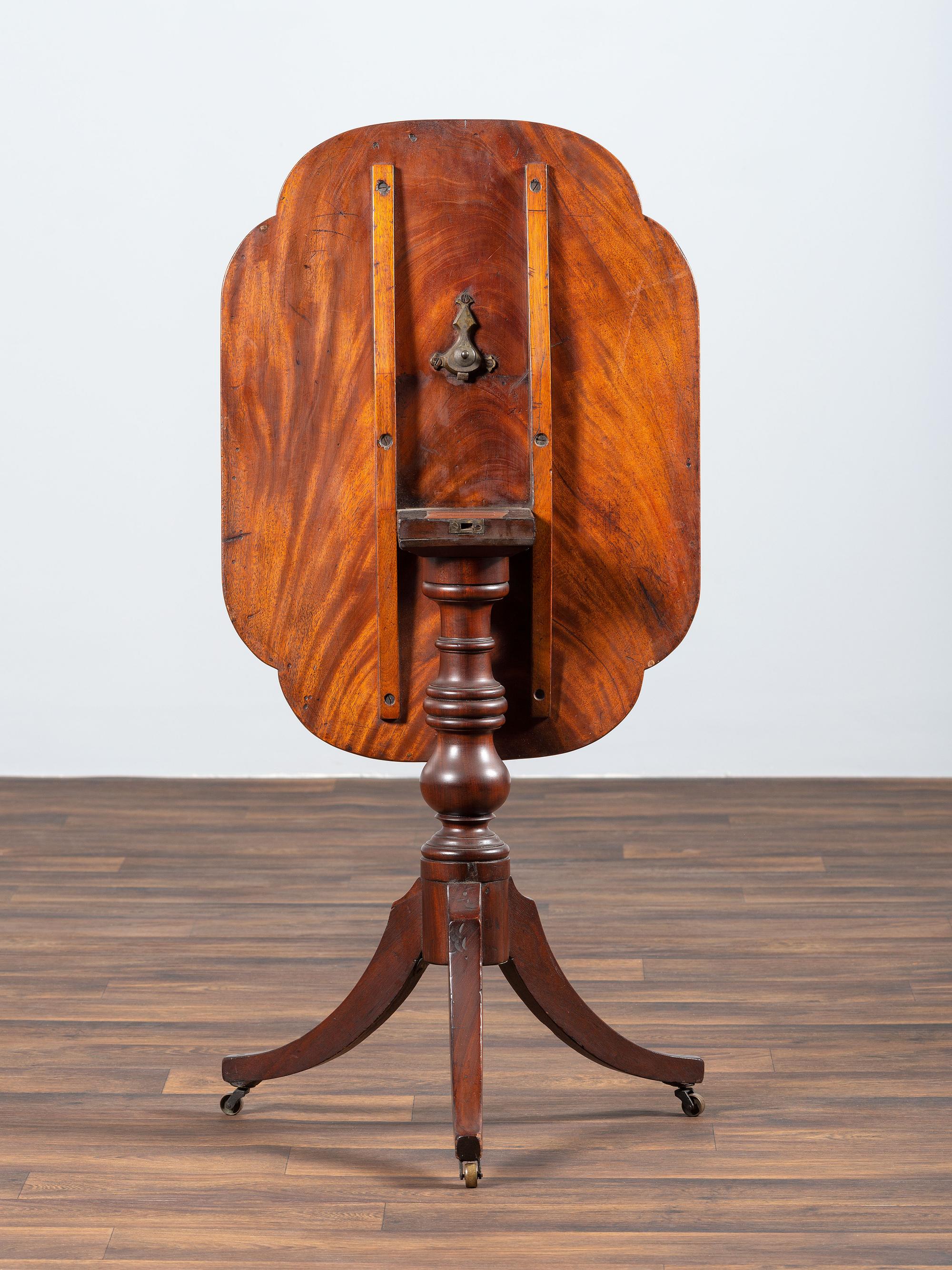 A Late Chippendale Figured Mahogany Tablet Tilt-Top Candlestand