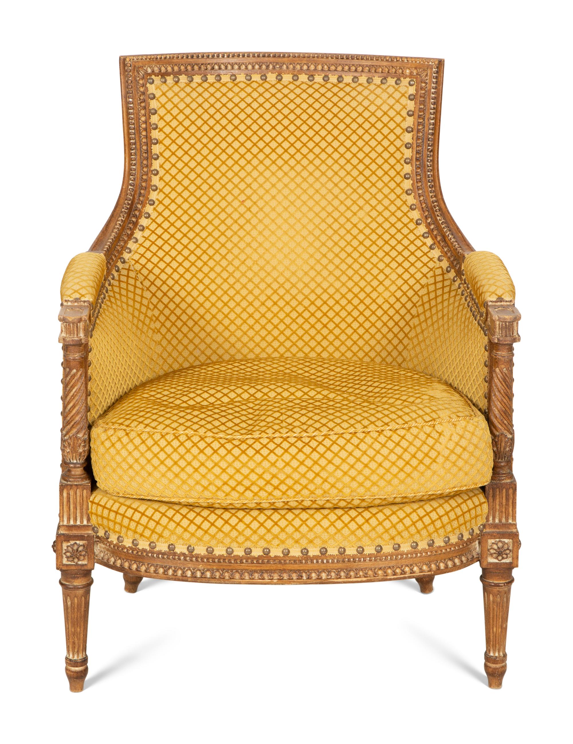 A Louis XVI Style Carved Beech Bergère