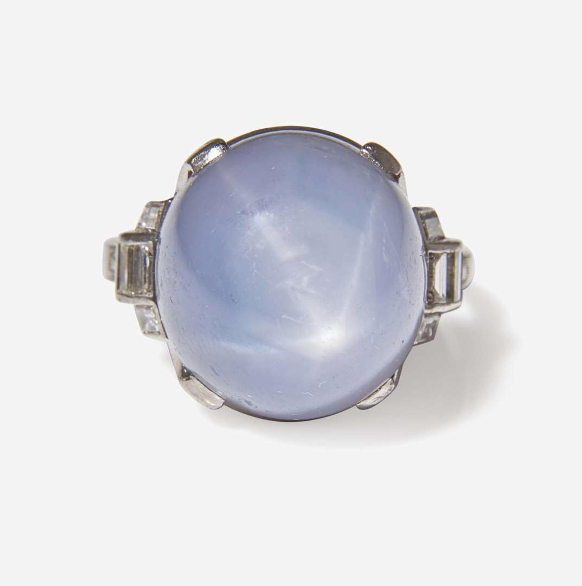 A Platinum, Diamond, and Star Sapphire Ring