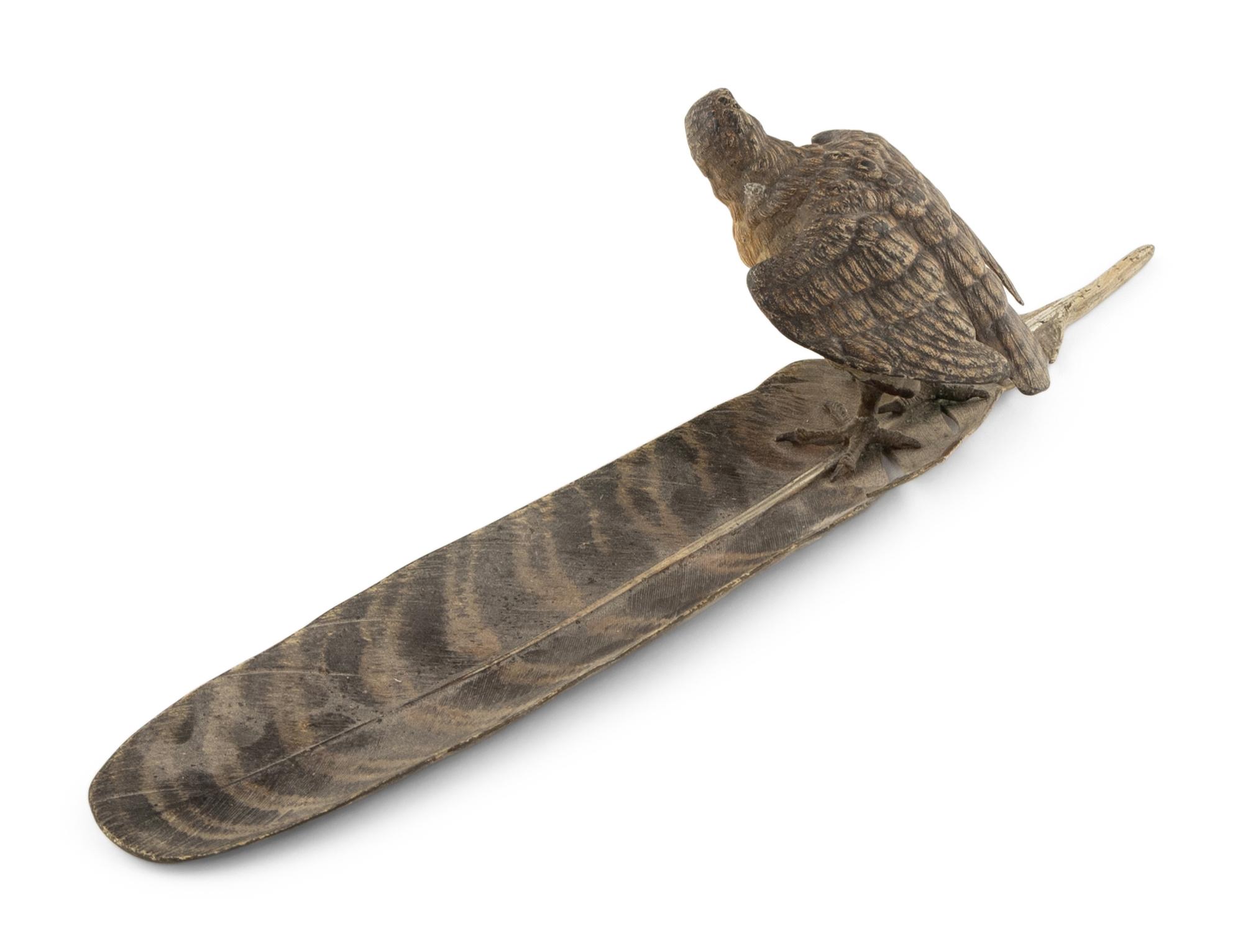 An Austrian Cold-Painted Bronze Figure of a Bird of Prey Perched on a Feather