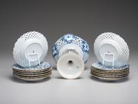 Fourteen Meissen ' Blue Onion' Reticulated Porcelain Plates