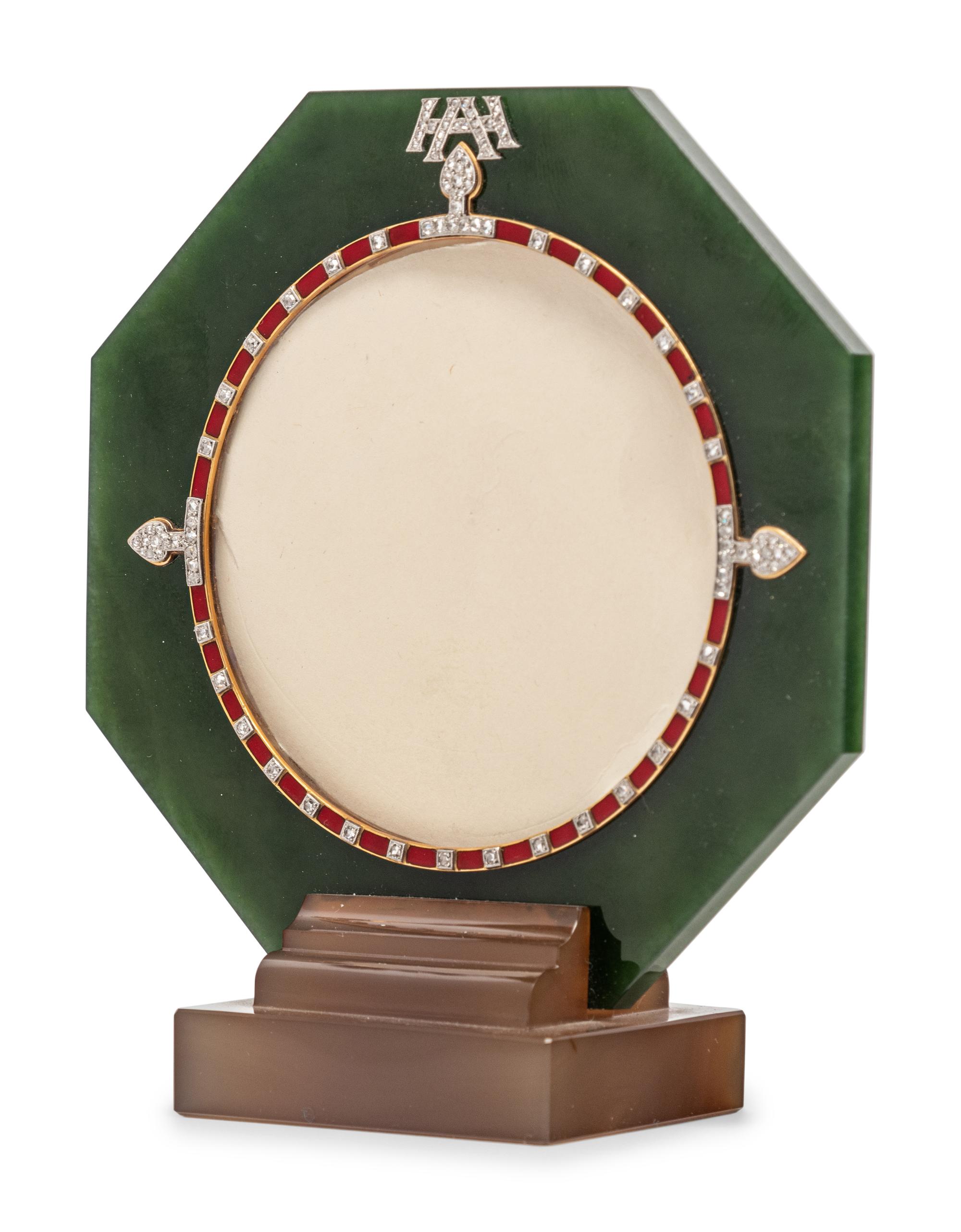 A Cartier Brown Agate, Green Jade, Yellow Gold, Enamel and Diamond Picture Frame