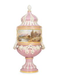 A Sèvres Style Painted Porcelain Lidded Urn with Bisque Floral Swags