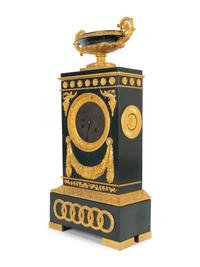 An Empire Gilt Bronze and Tôle Peinte Mantel Clock