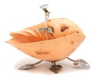 A Peruvian Camusso Silver Foliate-Form Stand, 20TH CENTURY, holding a melon shell