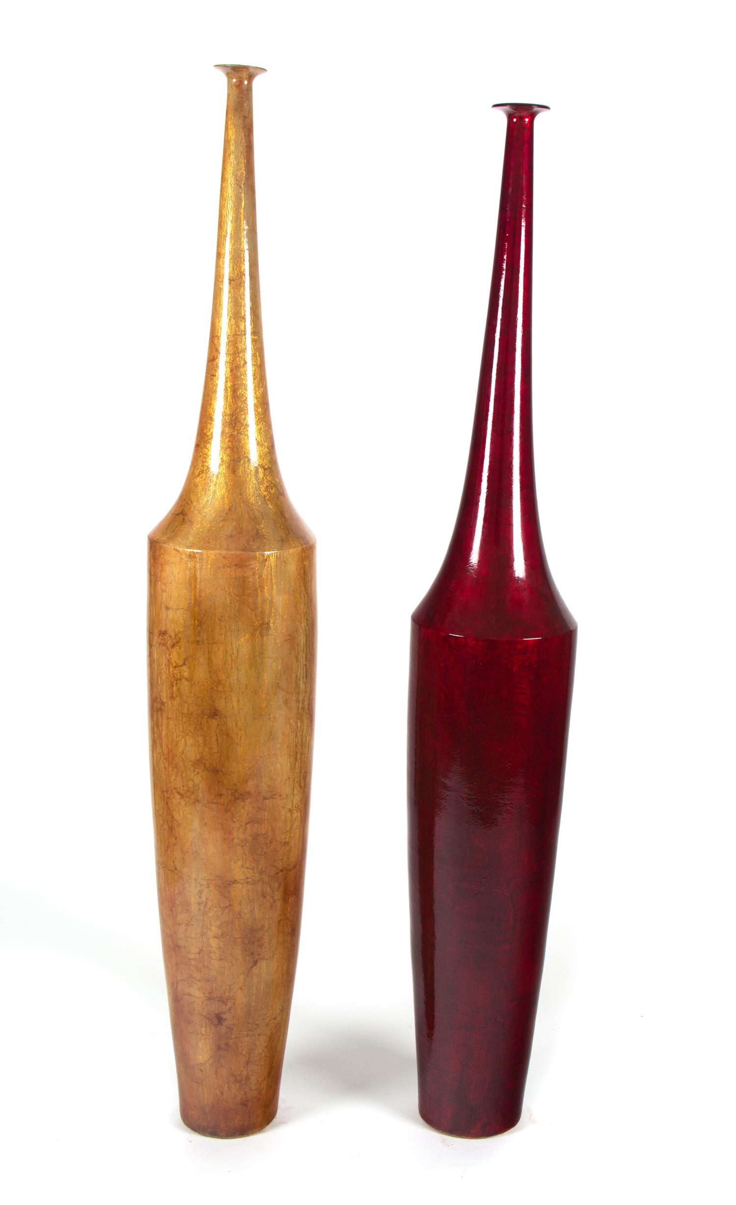 A Pair of Ceramic Floor Vases Height of taller 66 1/2 inches.