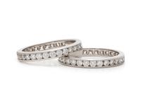 TIFFANY & CO., PAIR OF DIAMOND ETERNITY BANDS