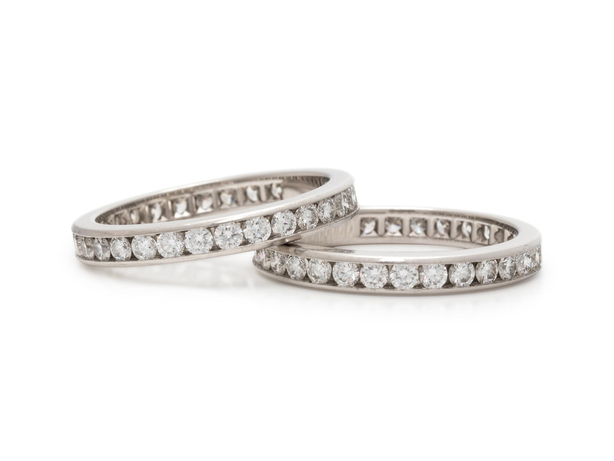 TIFFANY & CO., PAIR OF DIAMOND ETERNITY BANDS