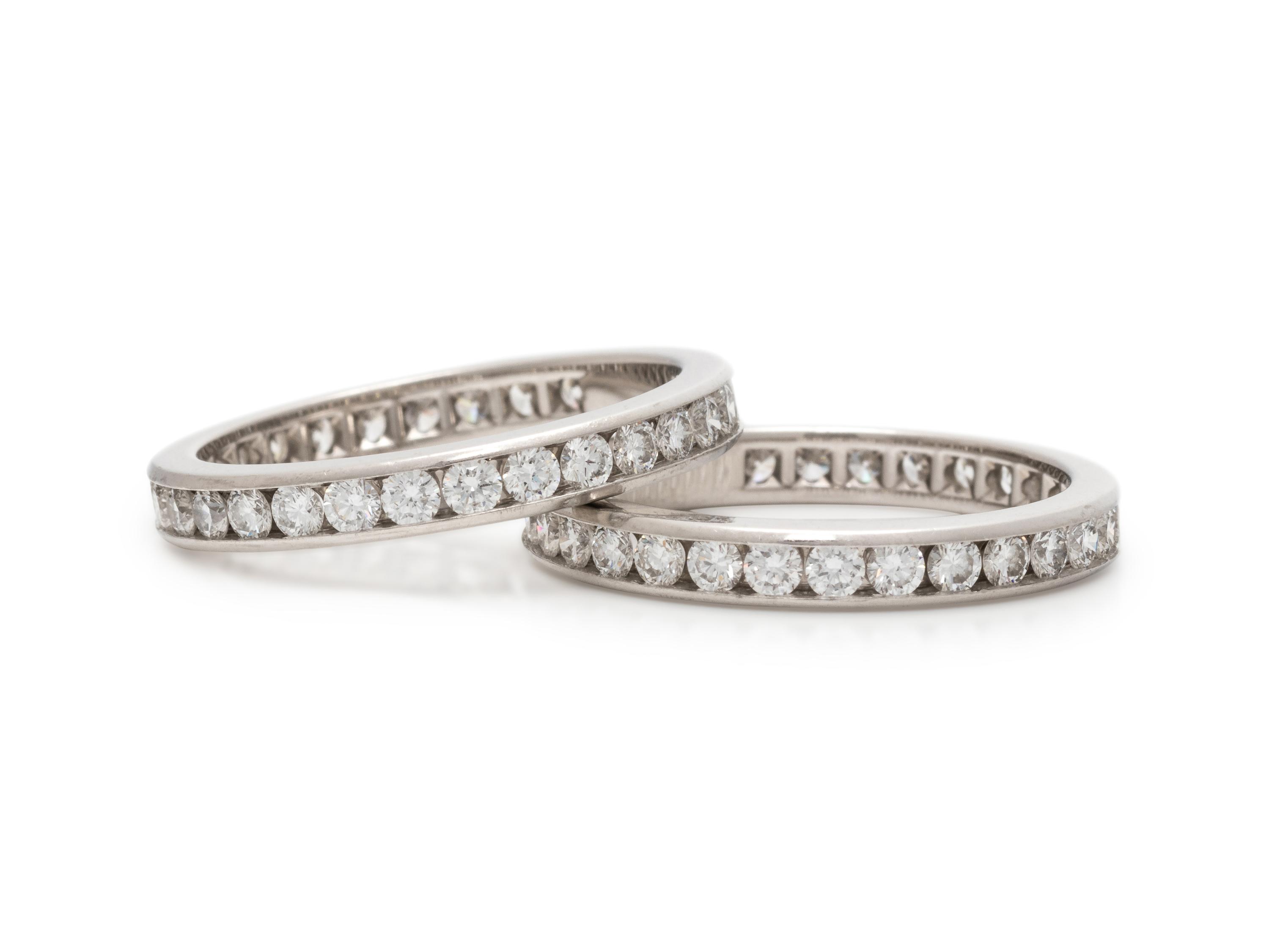 TIFFANY & CO., PAIR OF DIAMOND ETERNITY BANDS