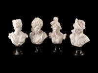 A Set of Four Italian Marble Busts of Women