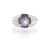 A 14 Karat White Gold and Star Sapphire Ring, 5.40 dwts.