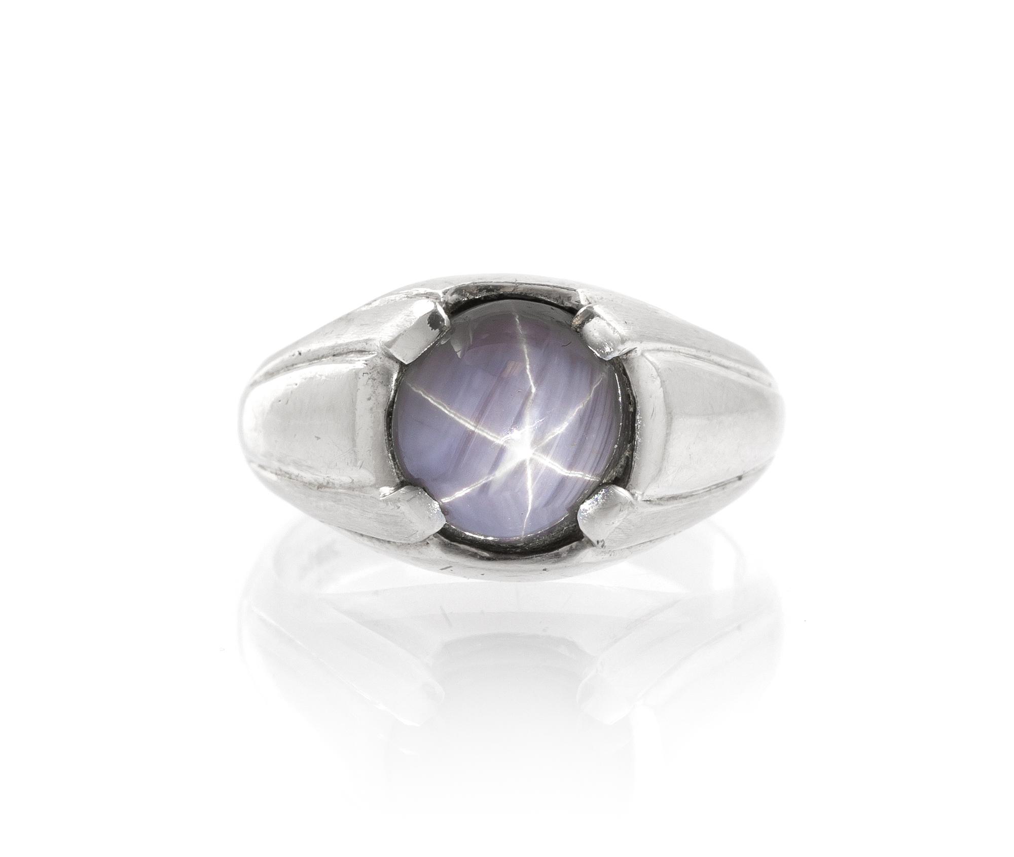 A 14 Karat White Gold and Star Sapphire Ring, 5.40 dwts.
