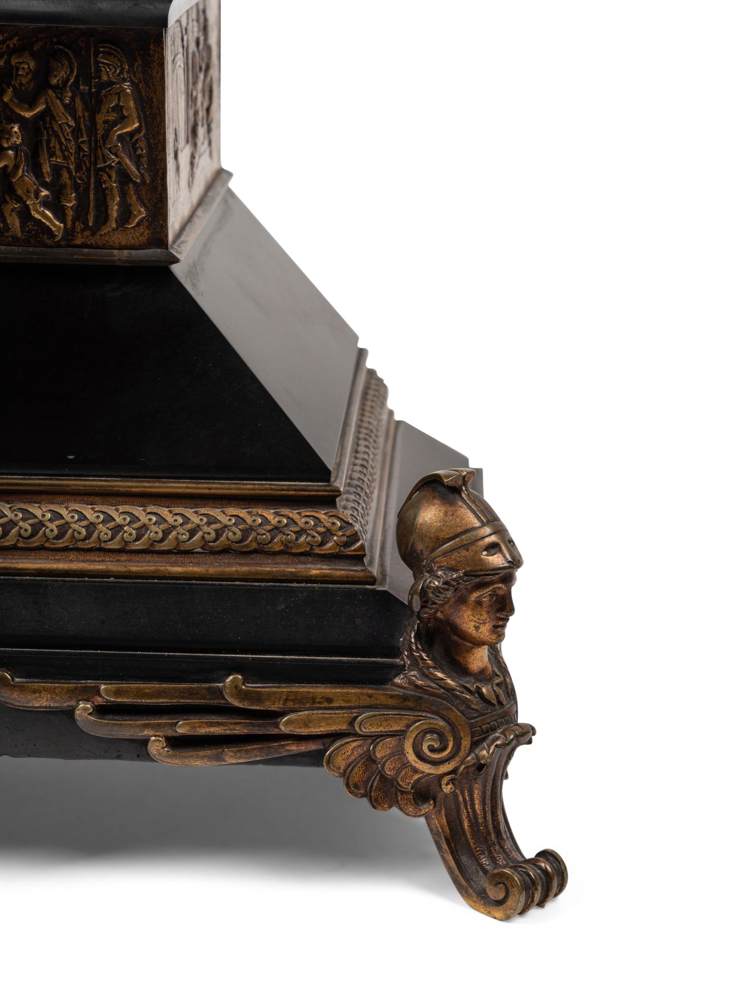 A French Gilt Bronze and Black Marble Mantel Clock