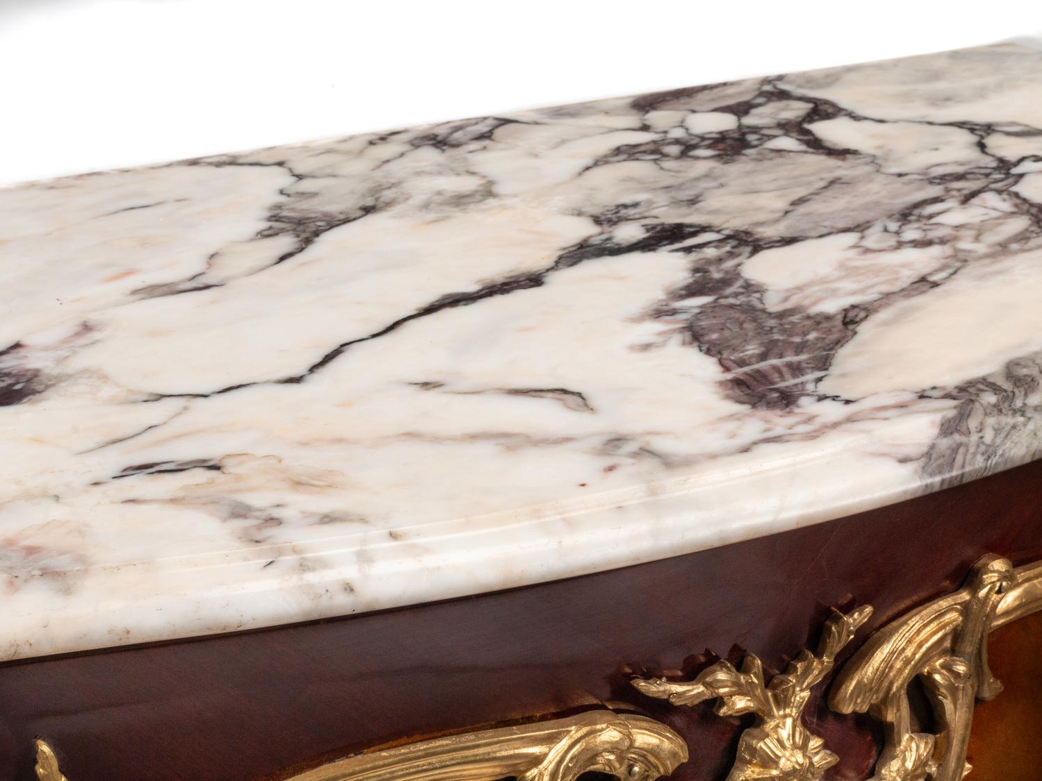 A Pair of Louis XV Style Gilt Bronze Mounted Marble-Top Cabinets
