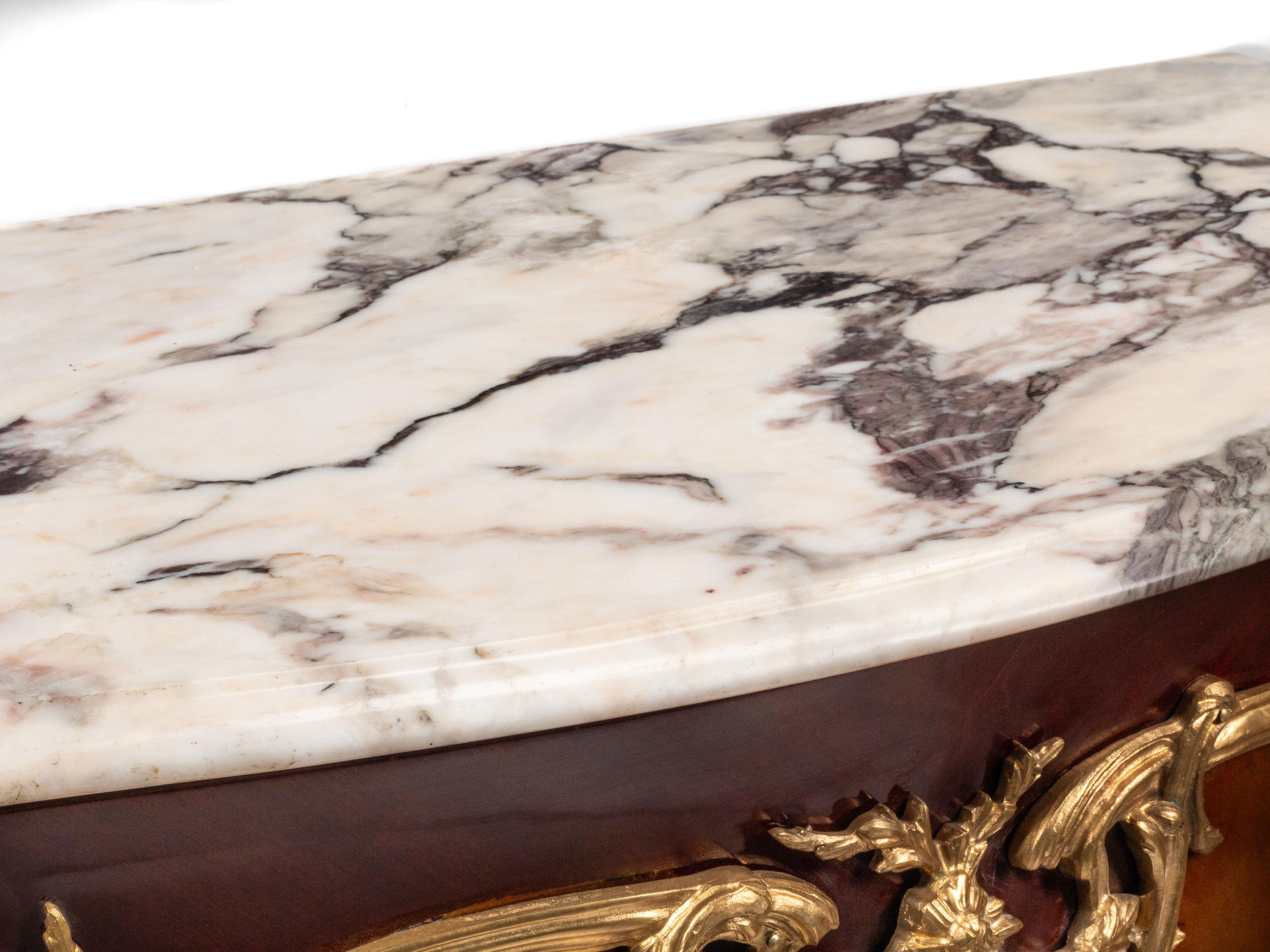 A Pair of Louis XV Style Gilt Bronze Mounted Marble-Top Cabinets