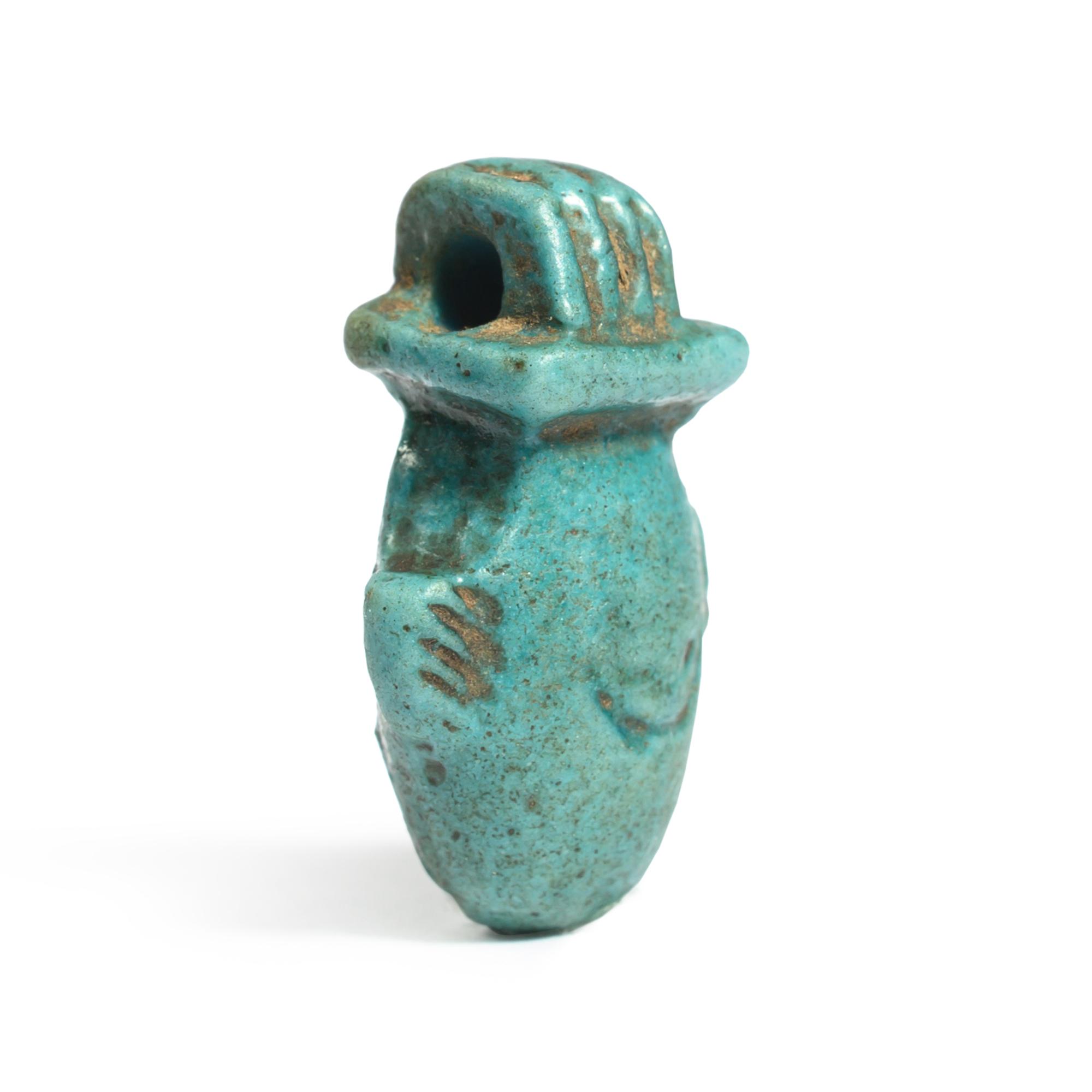 An Egyptian Faience Heart Amulet