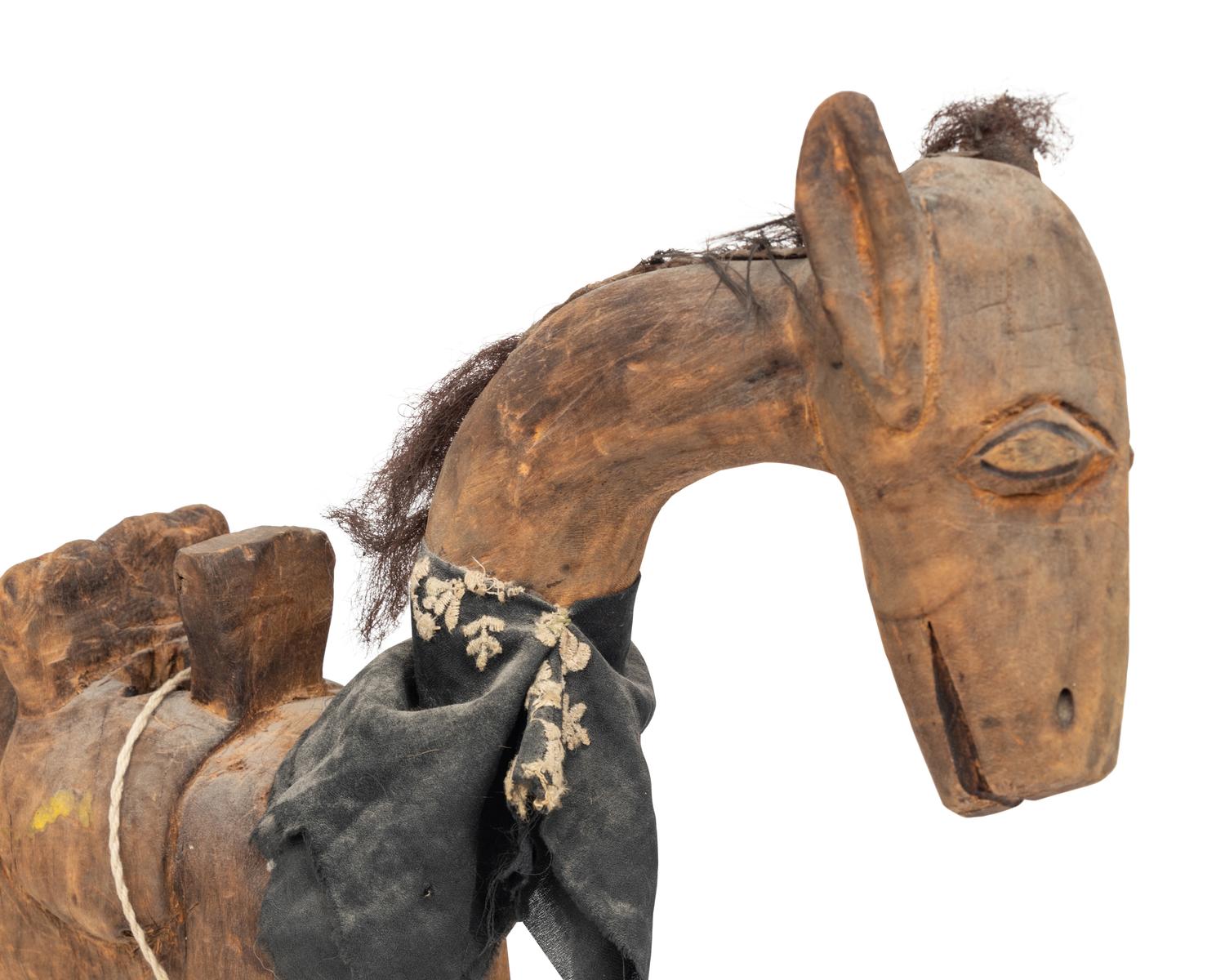 A Carved Wood Horse with Articulated Head