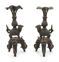 A Pair of Japanese Bronze Mythical Beast-Form Candle Holders