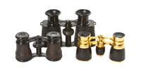 Two Pairs of French Leather Veneered Opera Glasses, Width of widest overall 4 3/4 inches.