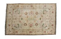 An Indian Wool Rug — 20TH CENTURY