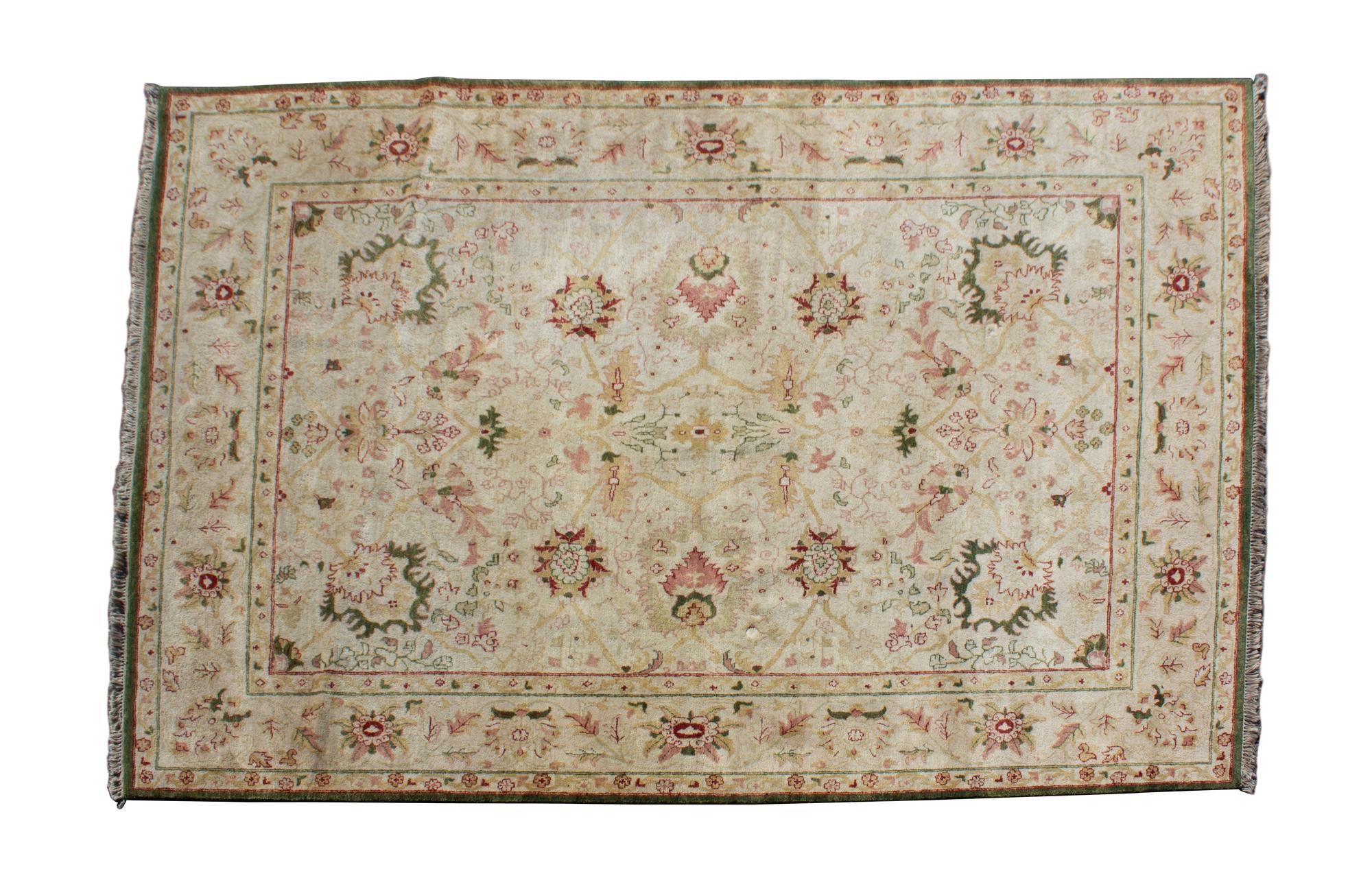 An Indian Wool Rug — 20TH CENTURY
