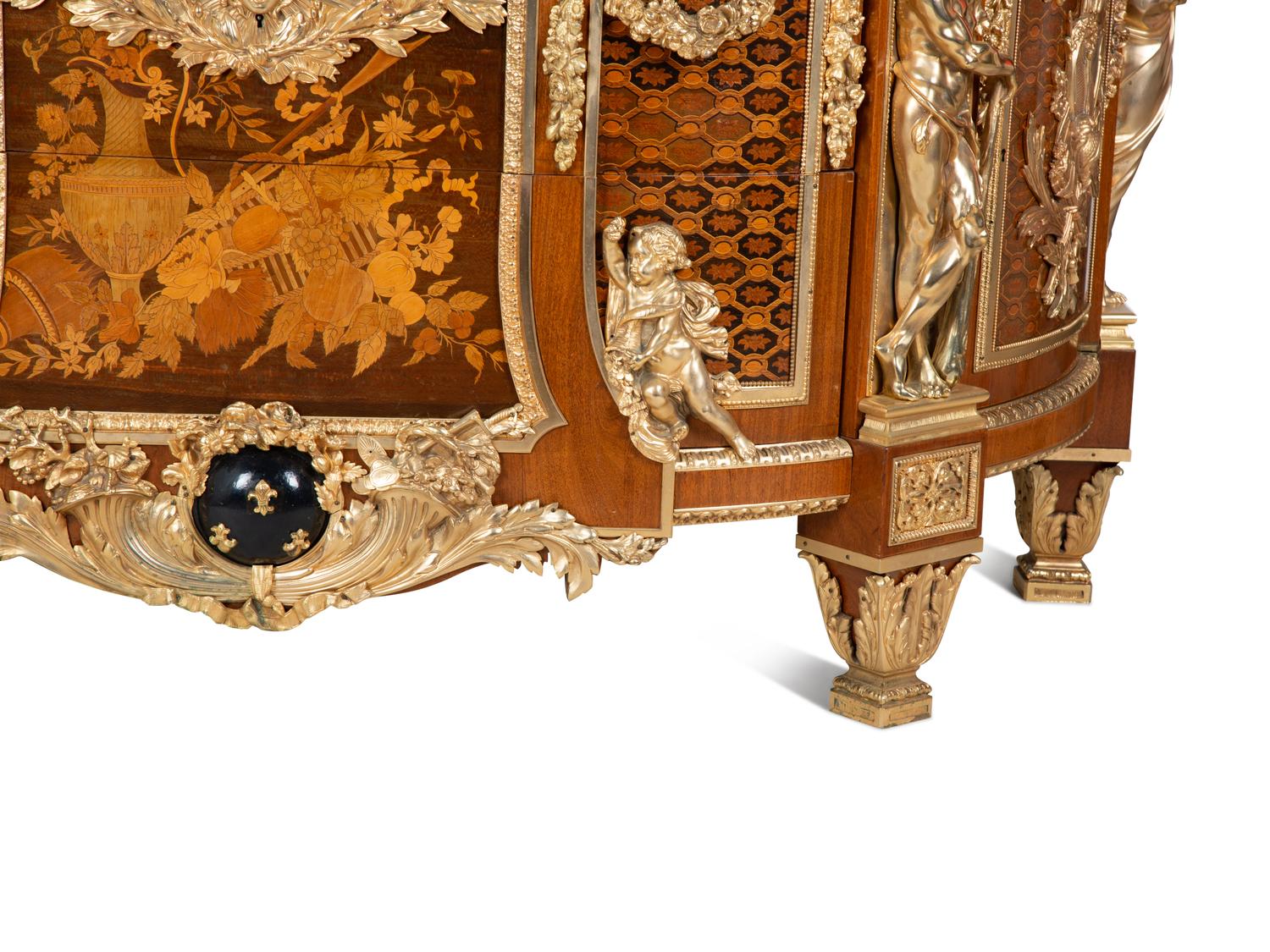A Louis XVI Style Gilt Bronze Mounted Marquetry Marble-Top Commode After the Model by Jean-Henri Riesener — FIRST HALF 20TH CENTURY