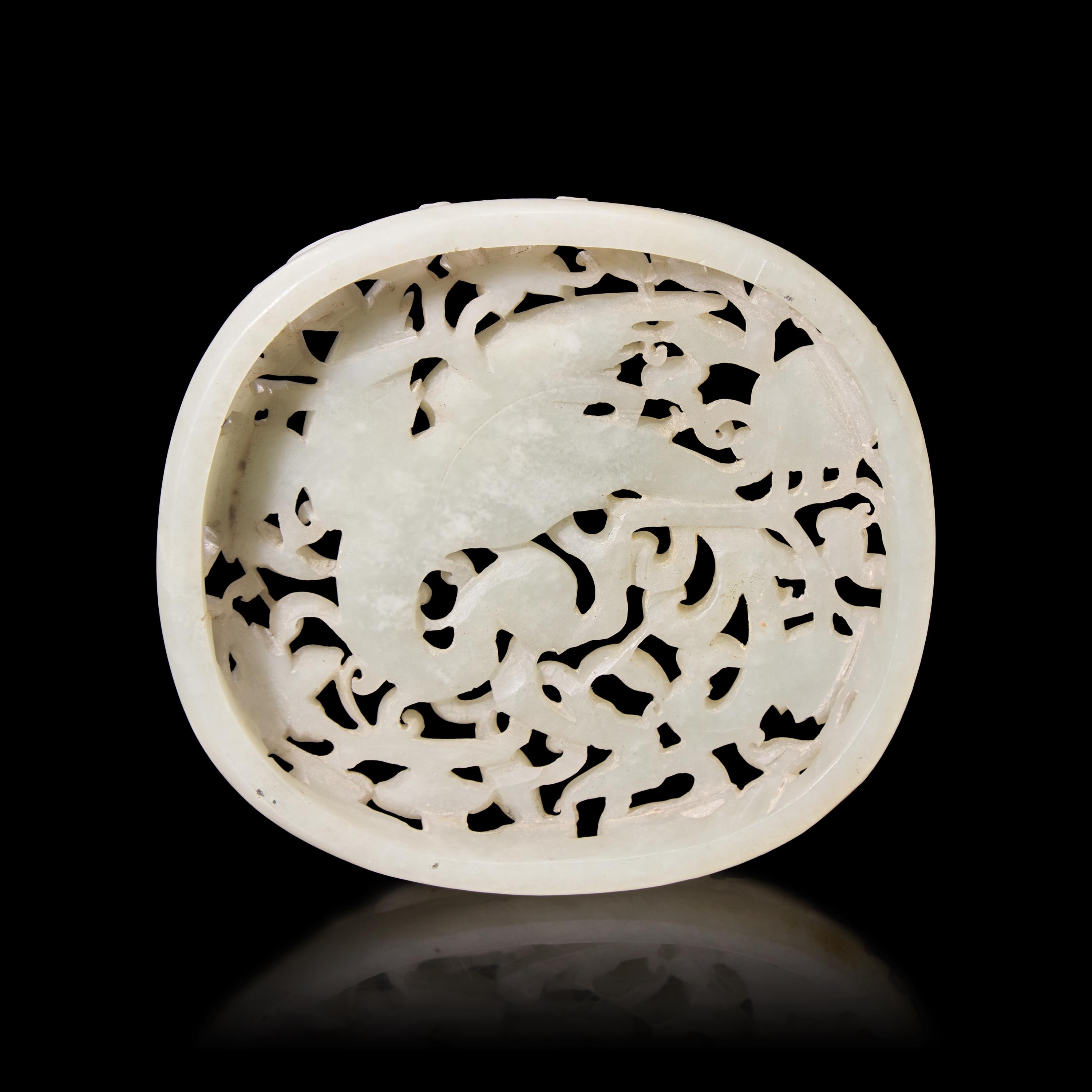 A Chinese Celadon Jade Reticulated Oval Plaque — 青玉镂雕鳳穿花佩