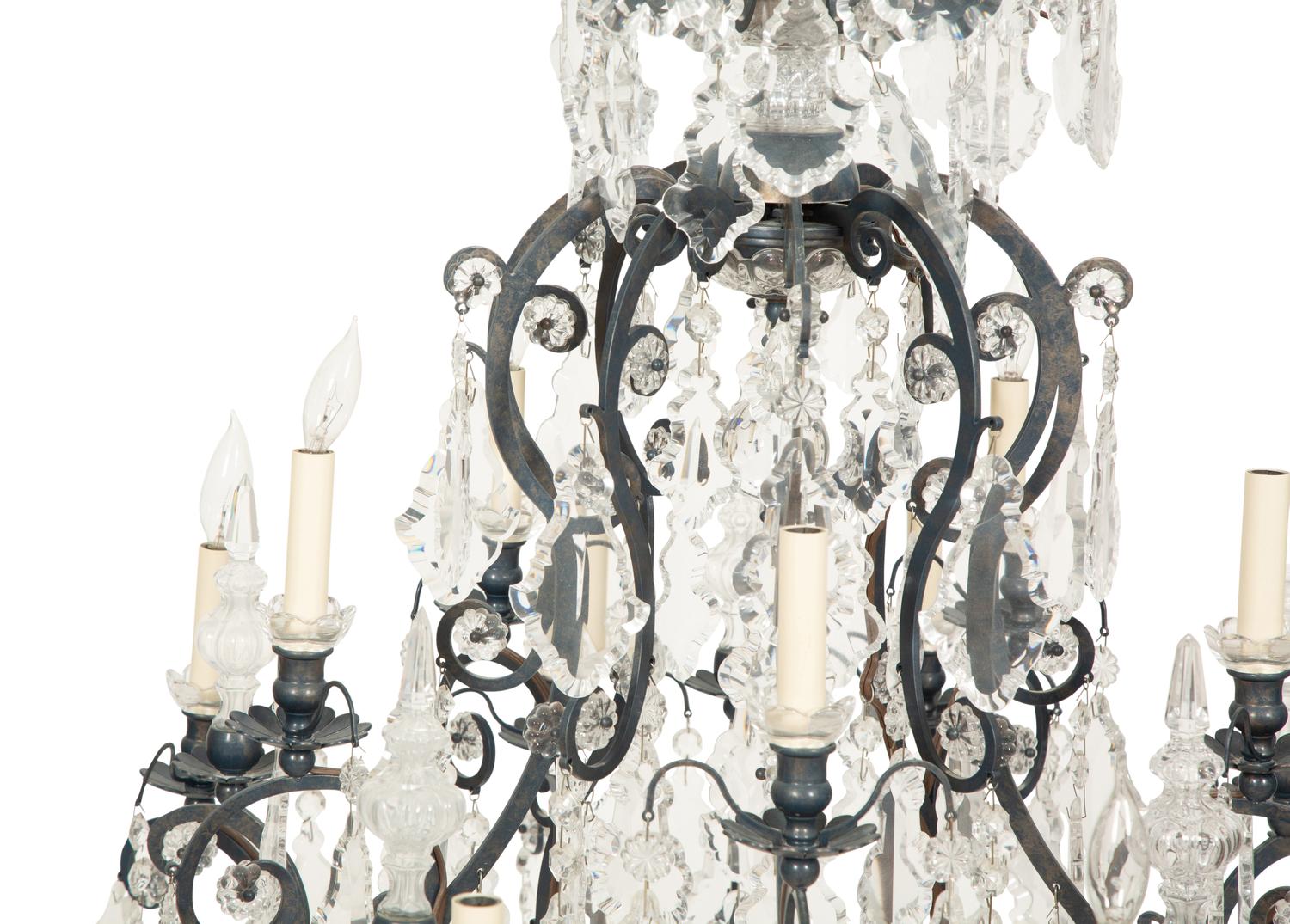 A Continental Iron, Tole and Cut Glass Fifteen-Light Chandelier