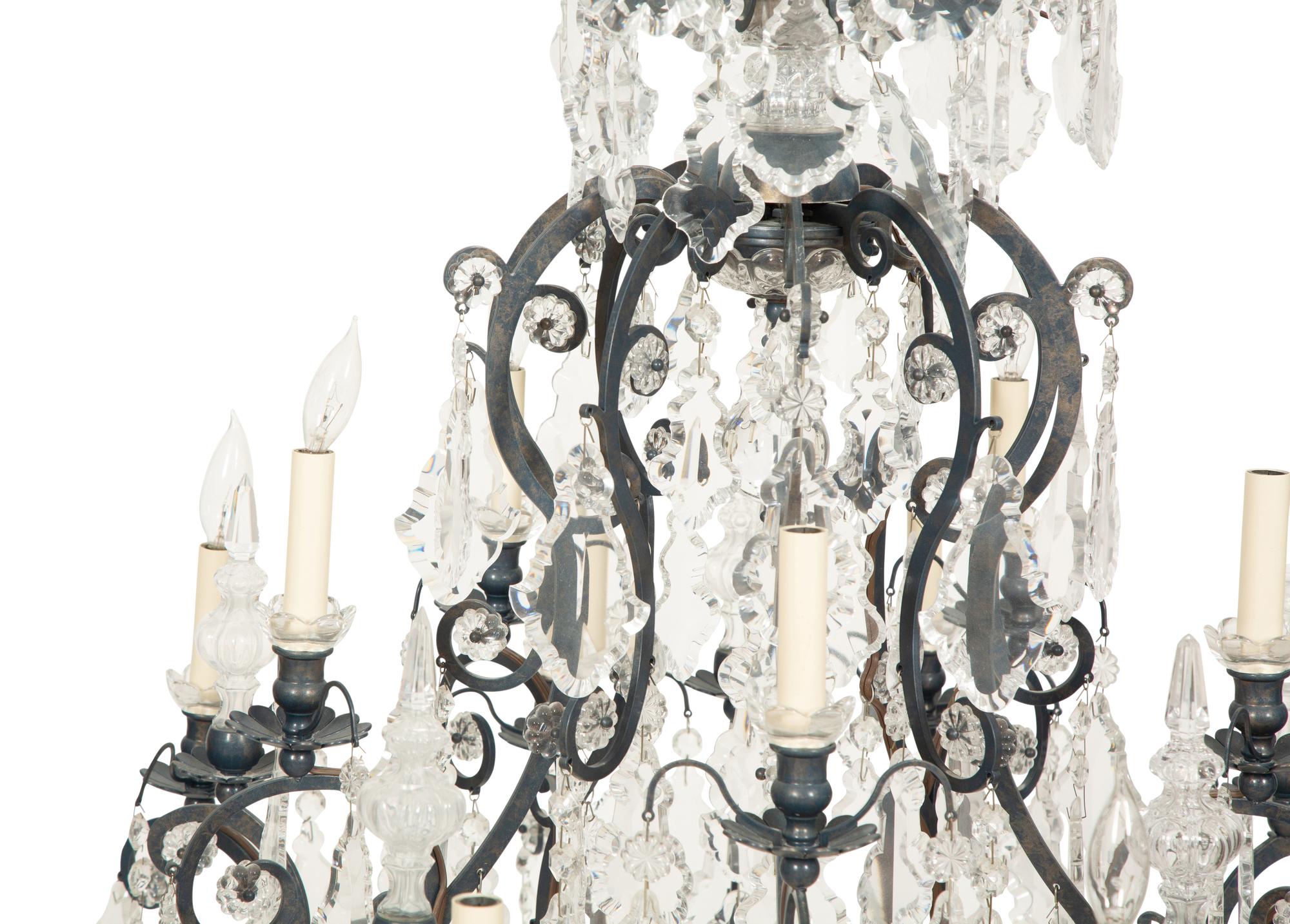 A Continental Iron, Tole and Cut Glass Fifteen-Light Chandelier