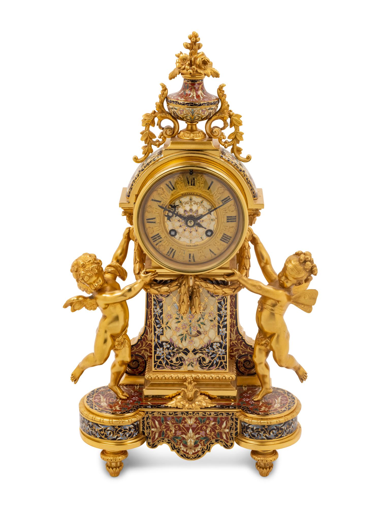 A French Gilt Bronze and Champlevé Clock Garniture Retailed by Tiffany and Co.