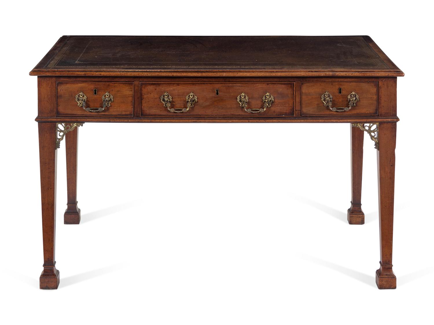 A George III Tooled-Leather Inset Mahogany Marlborough-Foot Writing Table