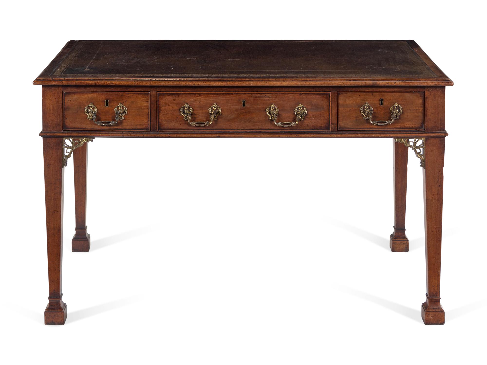 A George III Tooled-Leather Inset Mahogany Marlborough-Foot Writing Table