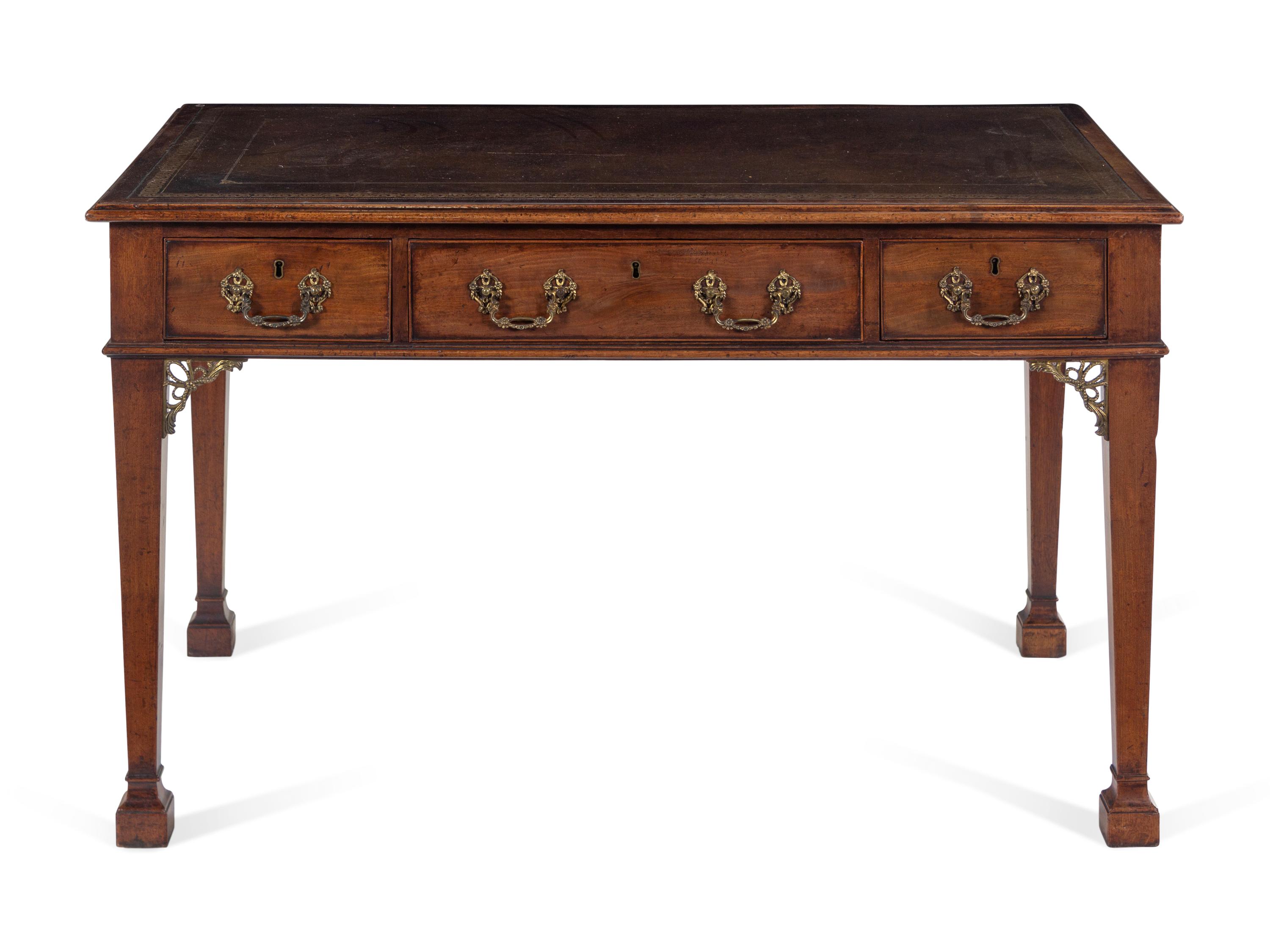 A George III Tooled-Leather Inset Mahogany Marlborough-Foot Writing Table