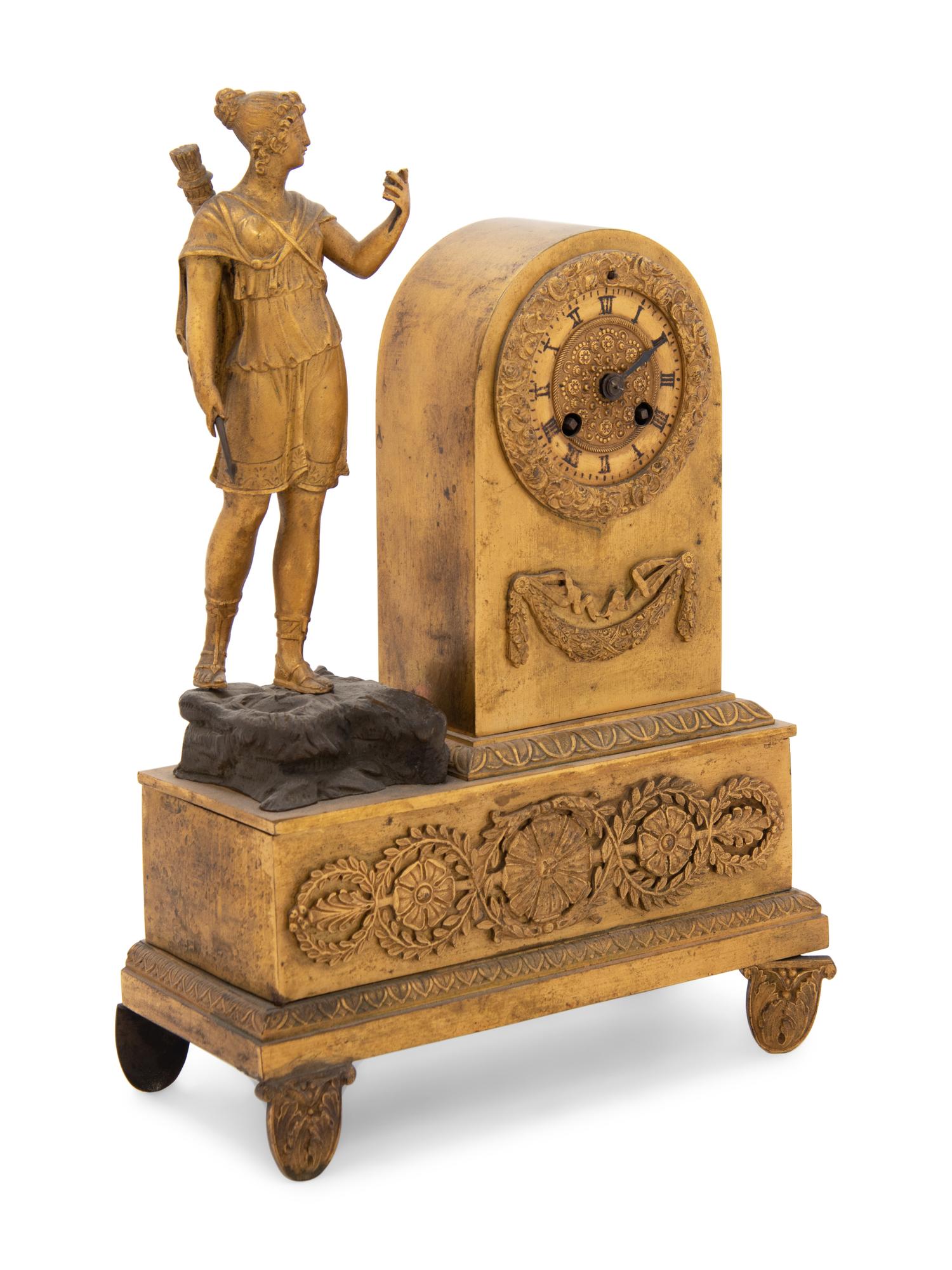 An Empire Gilt Bronze Figural Desk Clock