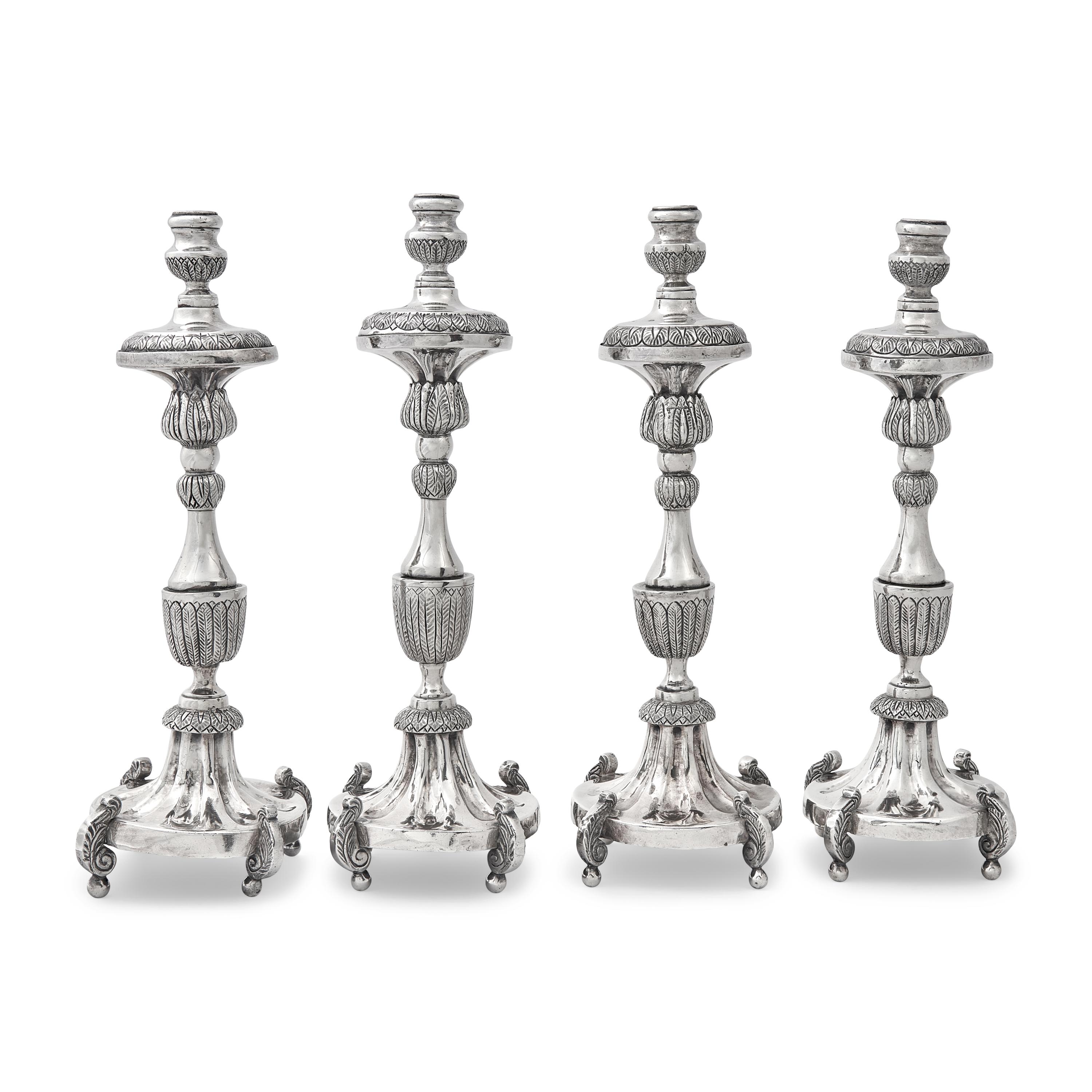 A Set of Four Mexican Silver Candlesticks