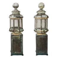 A Pair of Weathered Painted Sheet Metal Lanterns Converted to Bird Cages