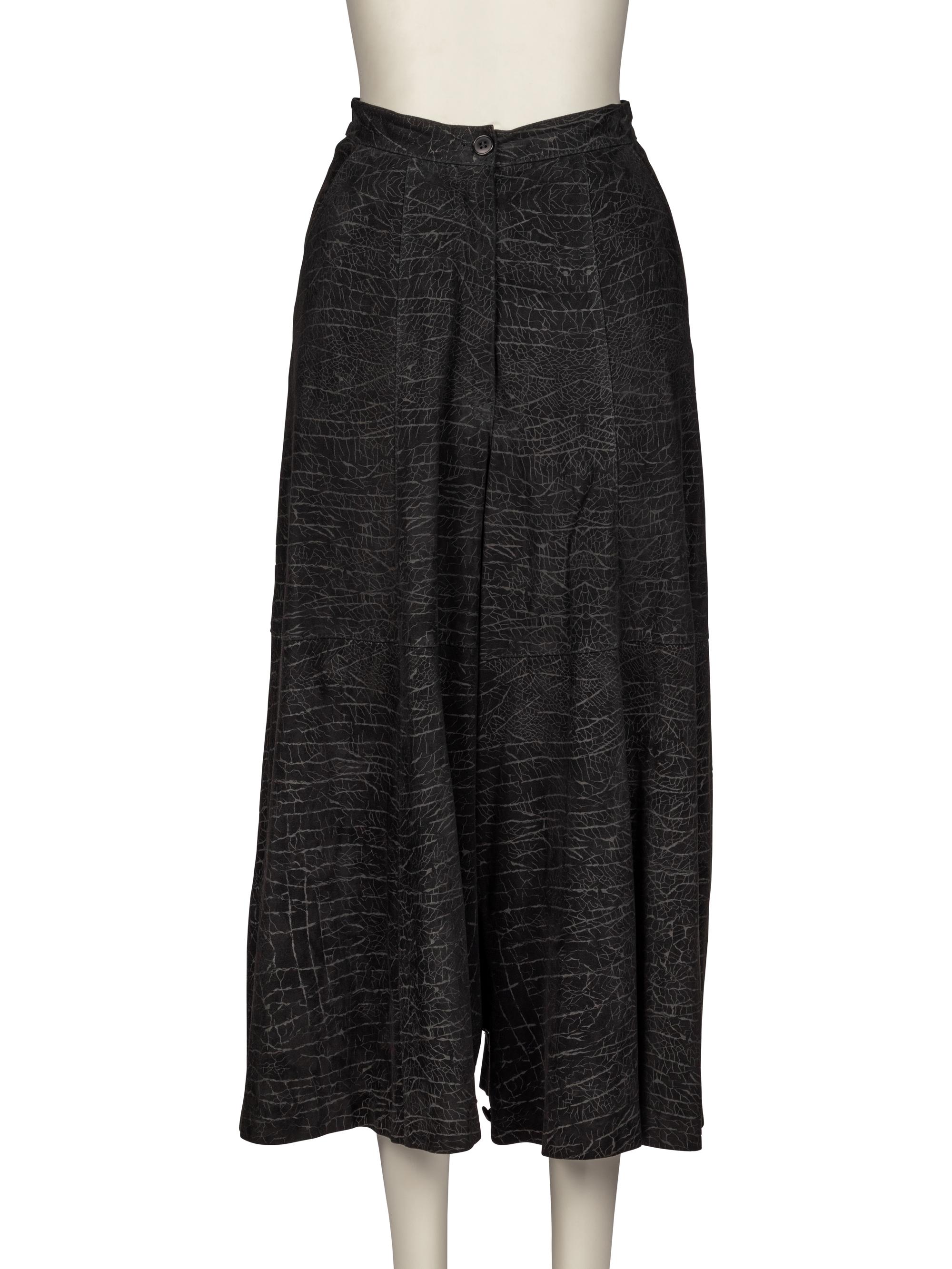 Ann Demeulemeester Sweater, Jean Paul Gaultier Blouse, Yohji Yamamoto Jacket, and Gianfranco Ferré Pant, 1990s