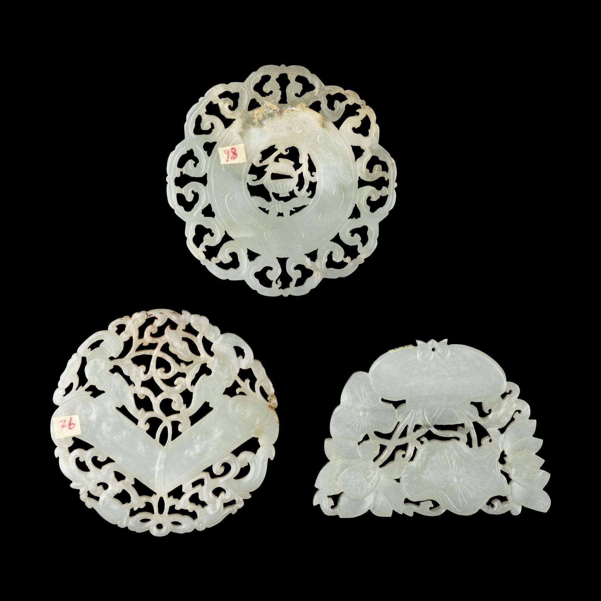 Three Chinese Reticulated White Jade Pendants