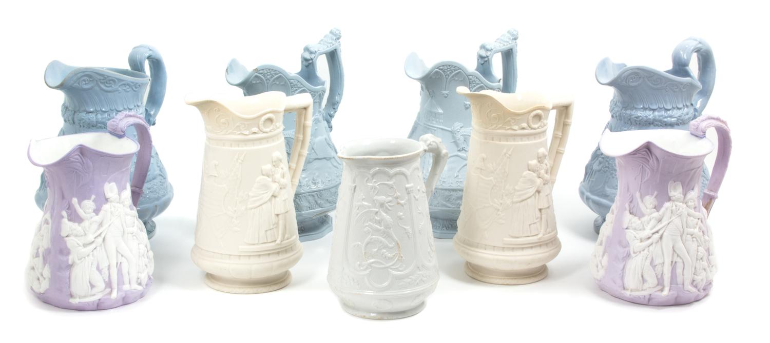 A Collection of English Salt Glaze Stoneware Pitchers Height of largest 11 inches. — 20TH CENTURY