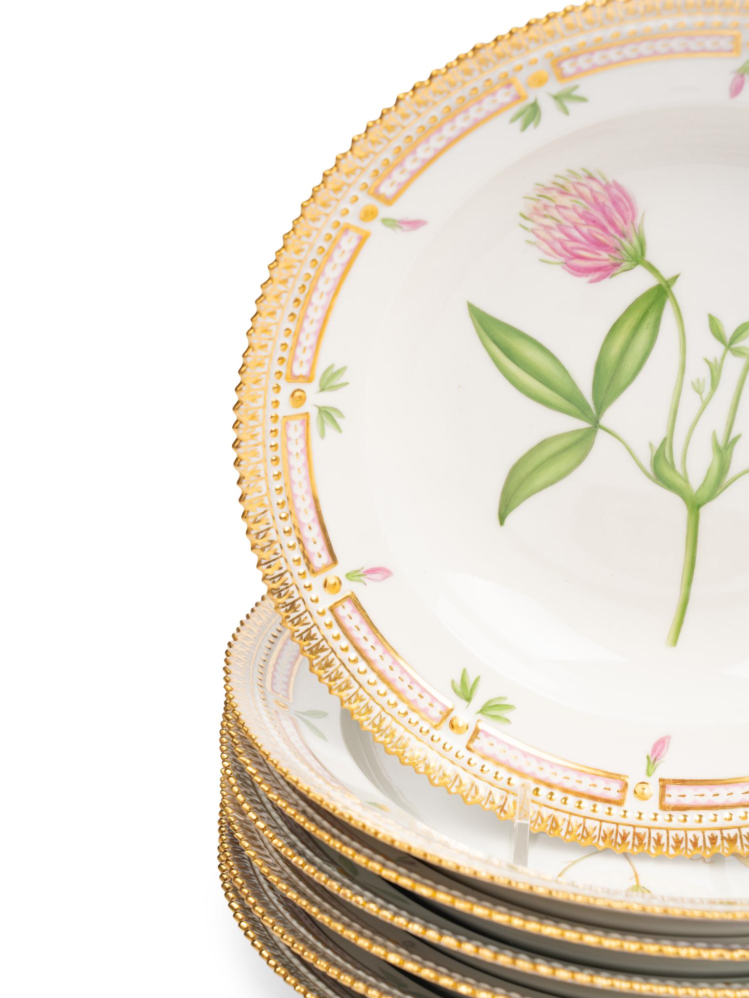 A Set of Fourteen Royal Copenhagen Flora Danica Porcelain Soup Plates