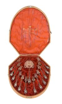 A Dutch Silver Petit Four Service, EARLY 20TH CENTURY, comprising a server and twelve forks in a fitted case marked Van Arcken & Co., B