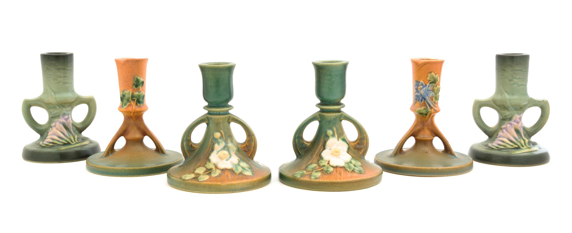 Three Pairs of Roseville Candlesticks Height of tallest pair 4 3/4 inches.