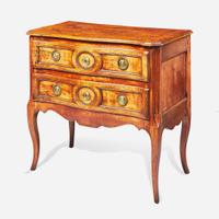 A French Directoire carved walnut commode circa 1800