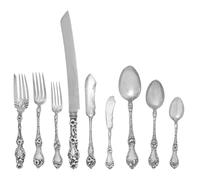 An American Silver Flatware Service, Reed and Barton, Taunton, MA, Les Cinq Fleurs pattern, comprising: 8 dinner knives 6 luncheon kniv
