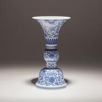 A Chinese Blue and White Porcelain Gu Vase, Jiaqing Mark and of the Period — 清嘉慶 青花纏枝蓮八吉祥花觚