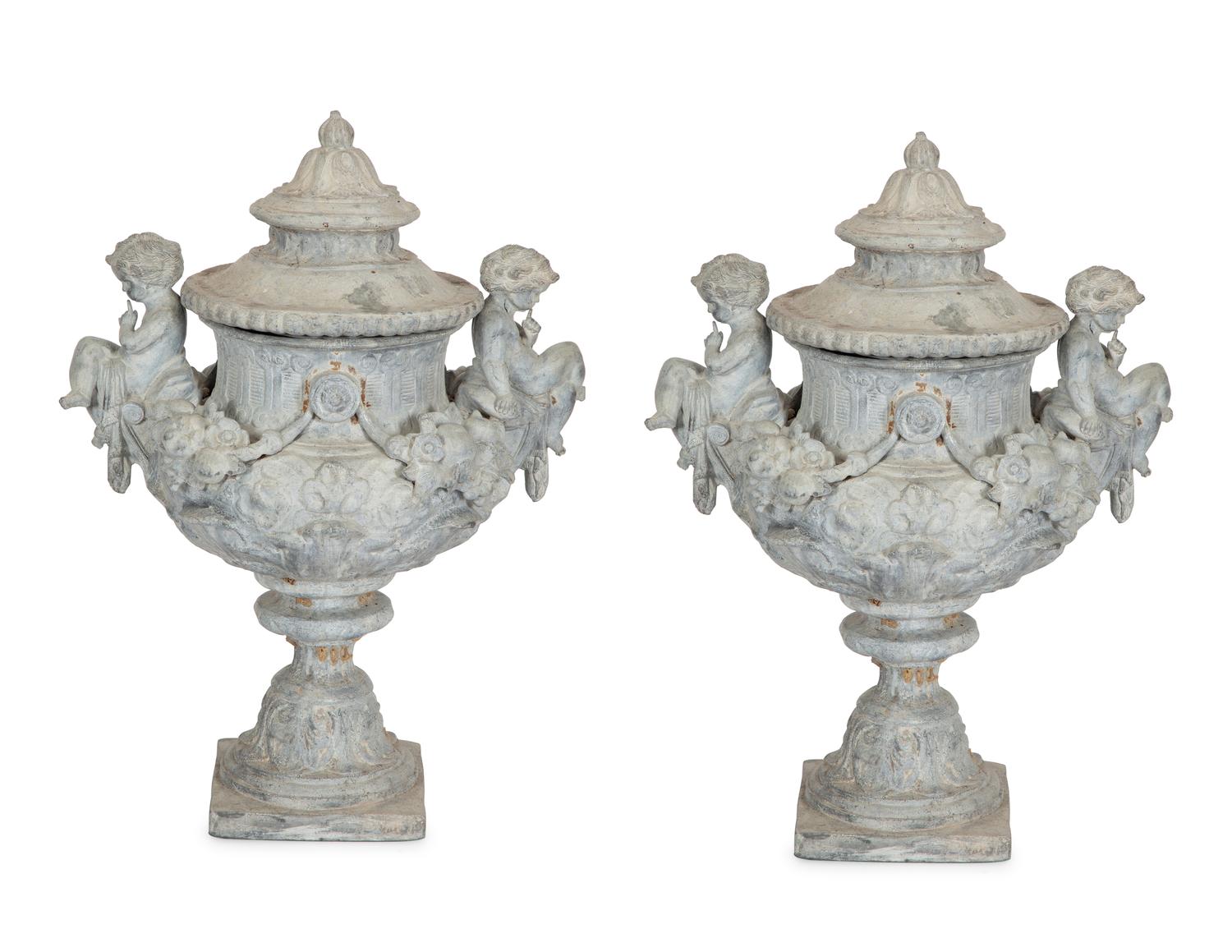 A Pair of Classical Style Cast Stone Covered Urns